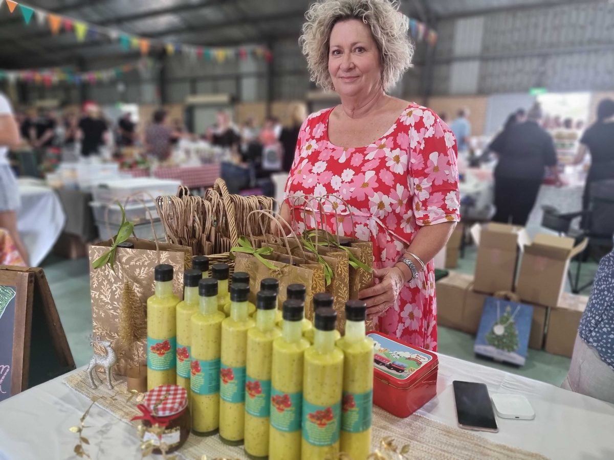 woman with her market stall of dressings