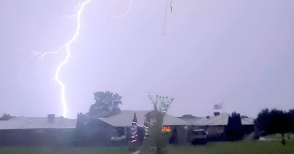 Inflatable Santas take flight and the lights go out as massive storm rips through the Riverina