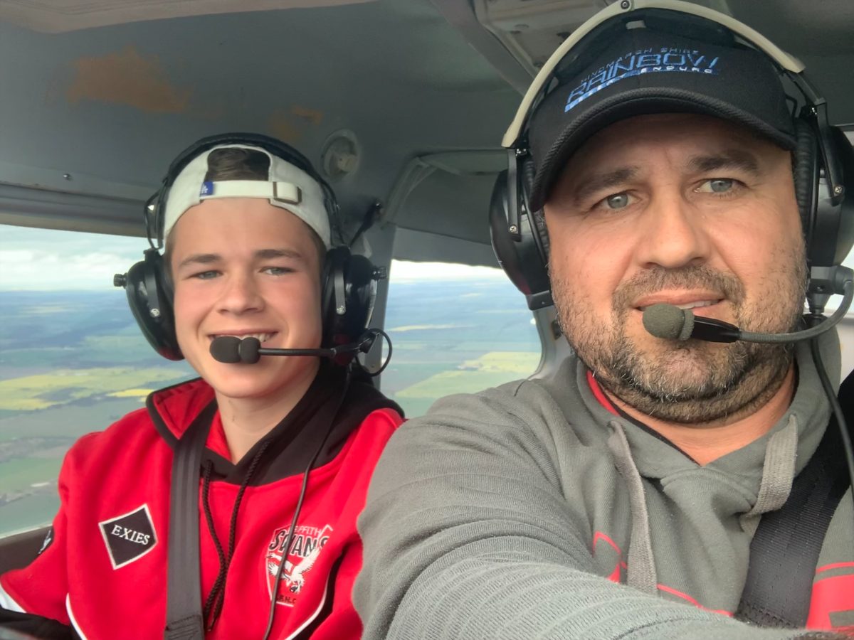 Father and son flying 