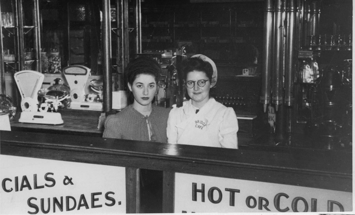 two women behind cafe counter in 1940s