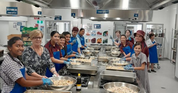 Marian Catholic College students 'energised' by feeding 200 Griffith families in need