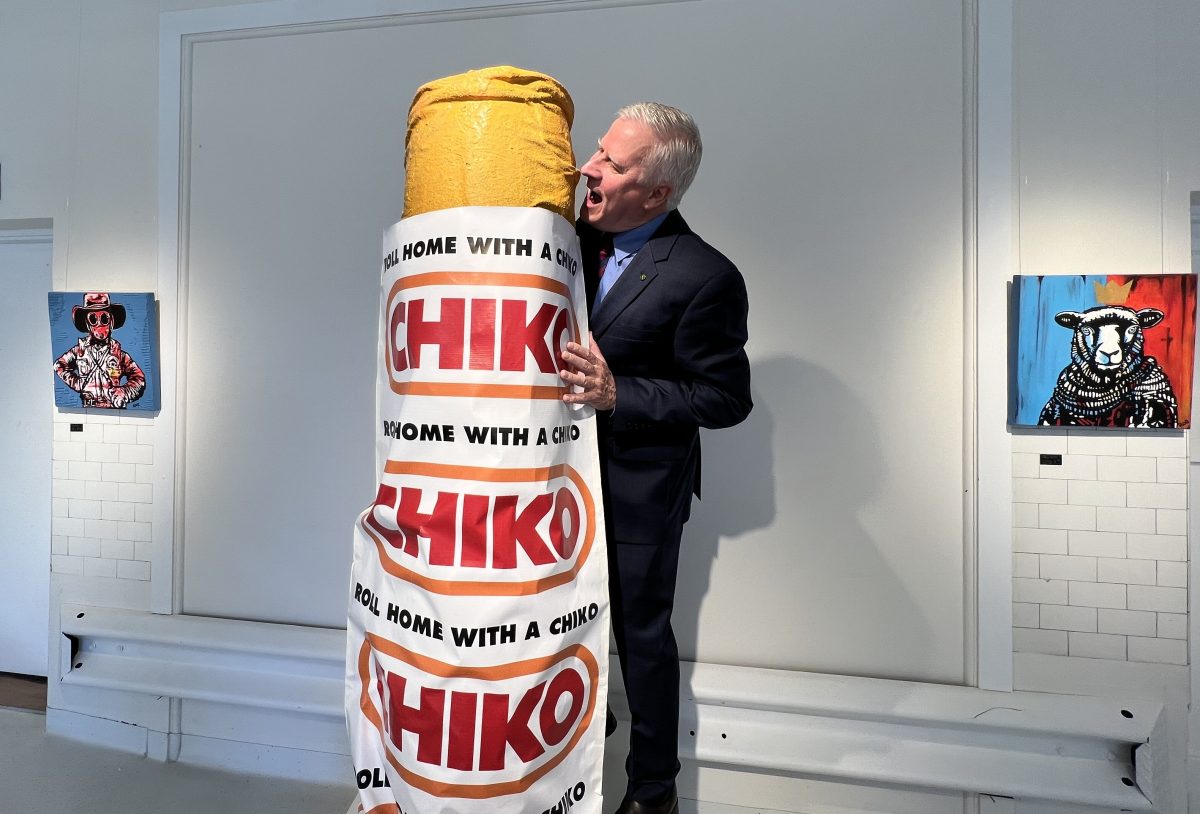 man with giant Chiko roll