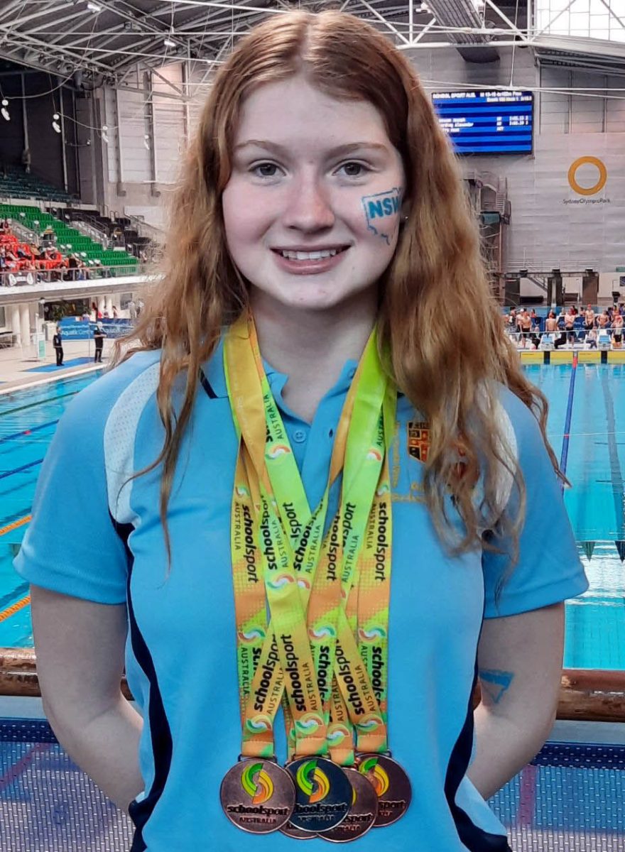 Nicole Taylor with medals 