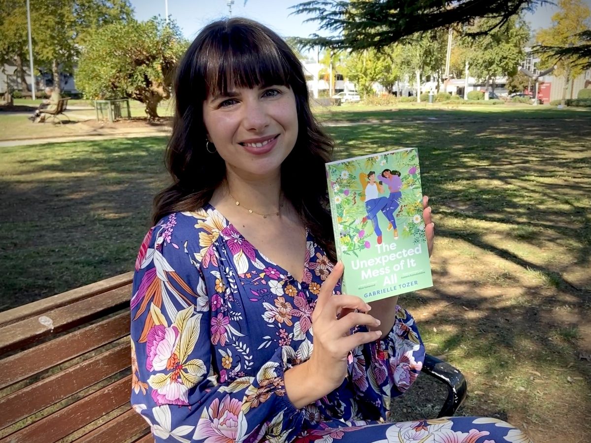 Wagga Wagga author Gabrielle Tozer with her latest young adult novel, <em>The Unexpected Mess of it All</em>.