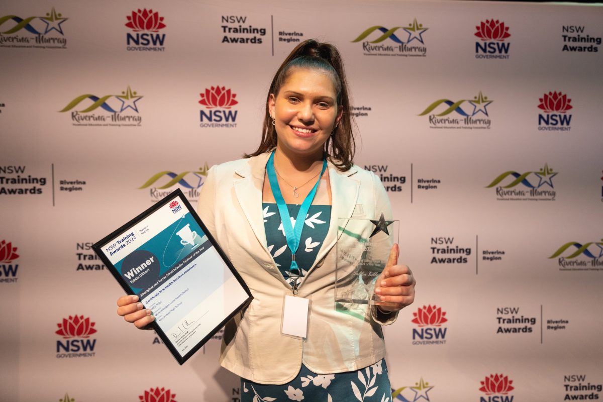Tahlia Gilbert with award