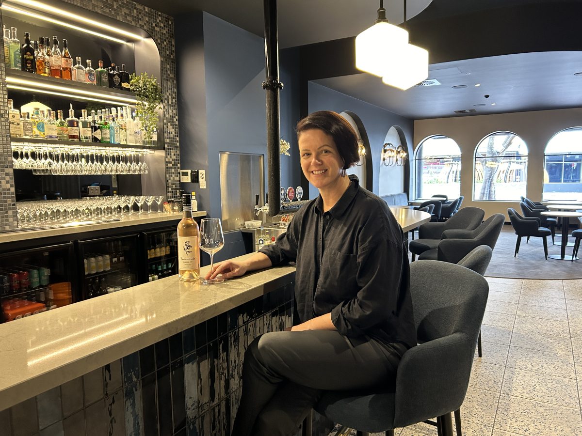 Woman sitting at bar