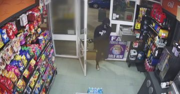Police appeal for information after man armed with hammer allegedly robs Wagga service station