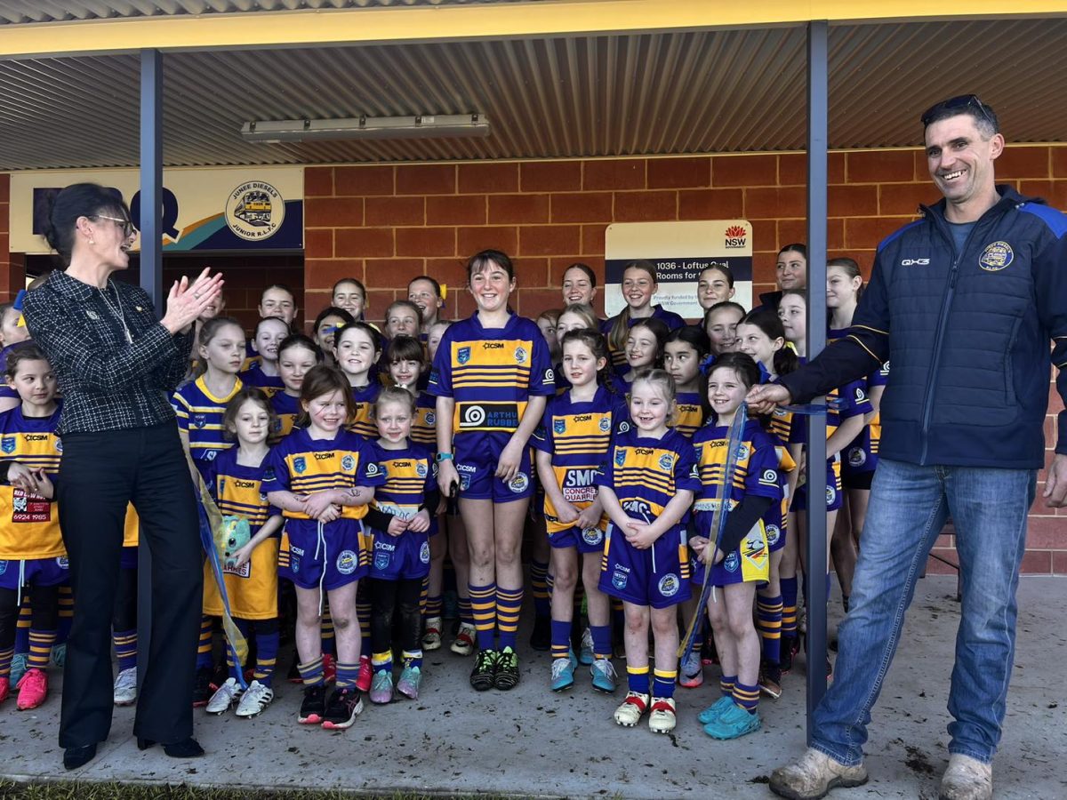 Junee Junior Rugby League tag girls with Member for Cootamundra Steph Cooke and club president Damien Field. 