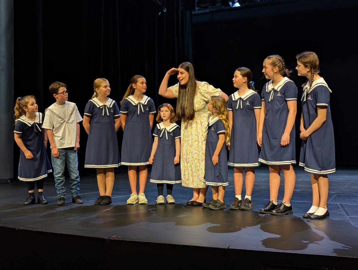 Hannah and the young cast of The Sound of Music. 