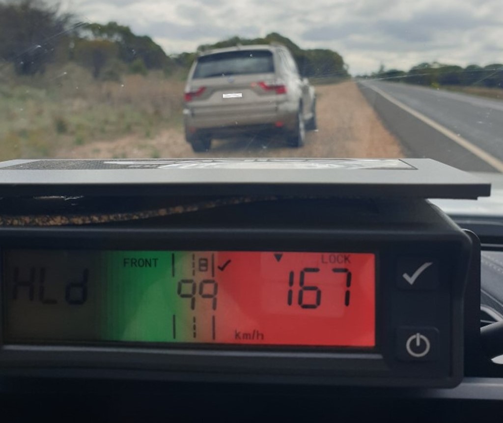 car pulled over and police speed detector