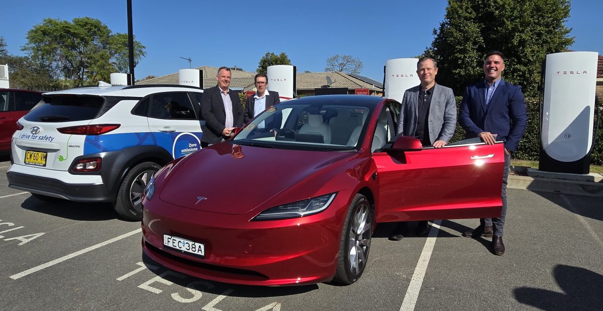 Wagga Wagga Mayor Dallas Tout, Independent Member for Wagga Wagga, Dr Joe McGirr NSW Department of Climate Change, Energy, the Environment and Water Engagement Officer Dan Wigmore and Tesla Regional Sales Manager Shane Tracy at the Telsa operated charging station Quality Hotel and Rules Club. 