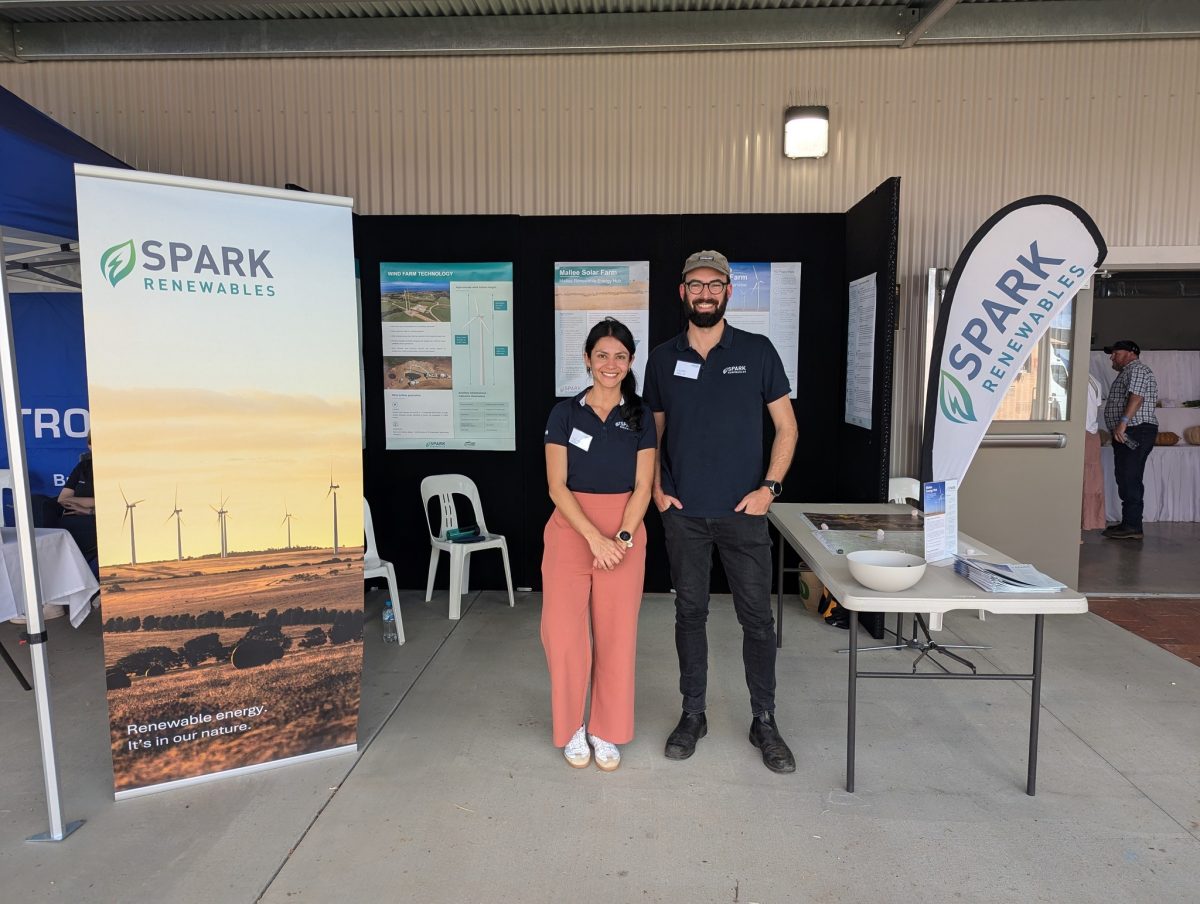 Two people at fair stall 