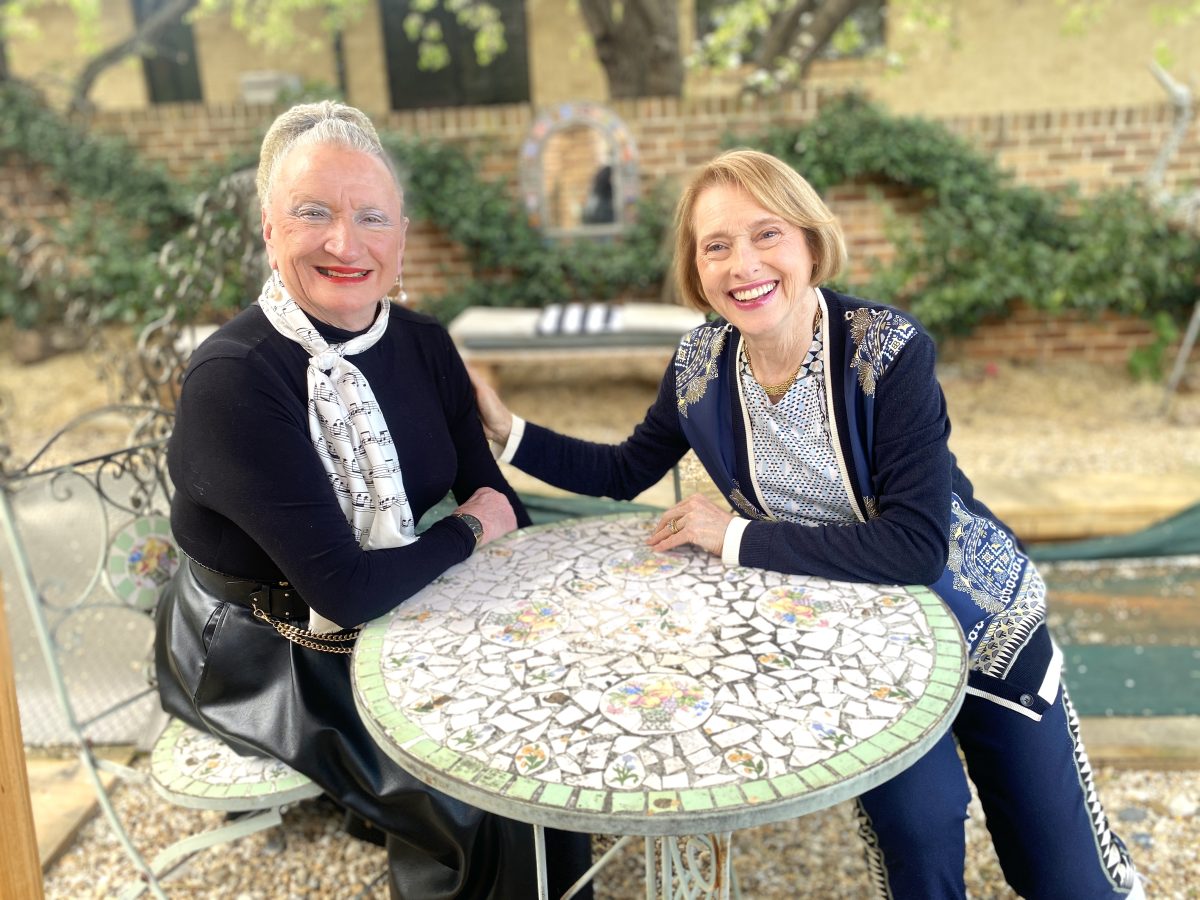 Gair Waterhouse on outside table with cousin 