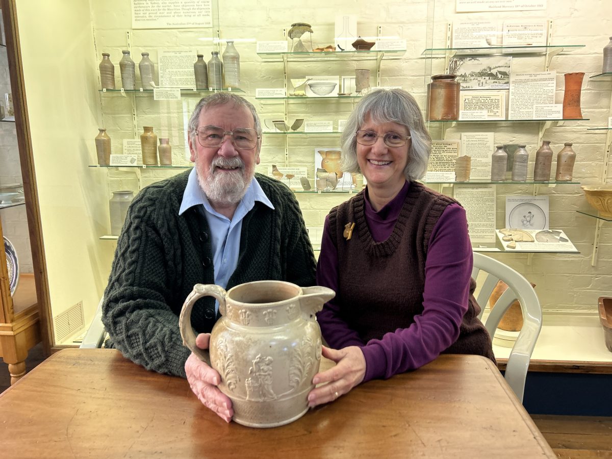 Geoff and Kerrie Ford with the unique and historically significant artefact crafted by the convict potter Jonathan Leak.