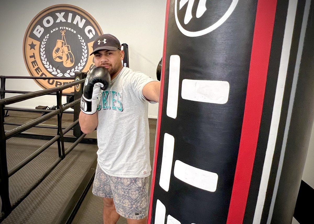 man using punching bag