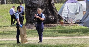 Police search for third man after alleged stabbing and shooting at Wagga campground