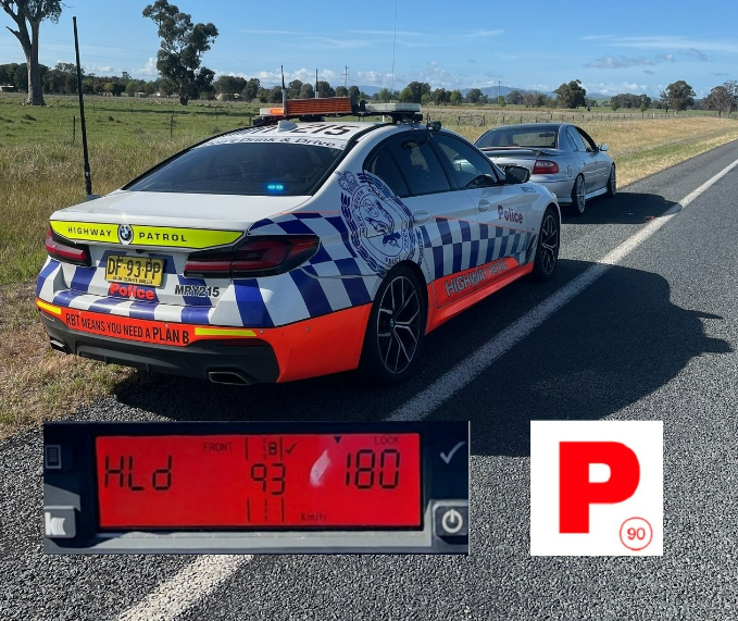 highway patrol car with driver pulled over