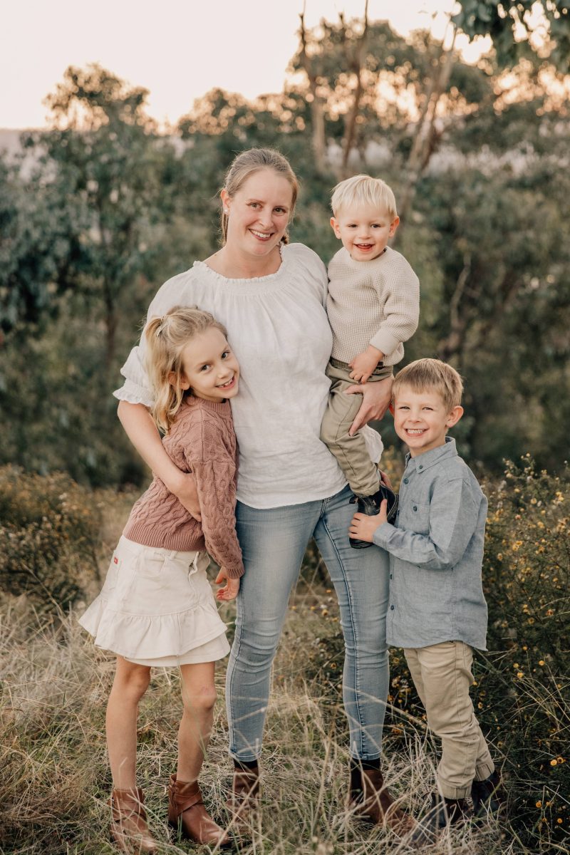 woman with her three children