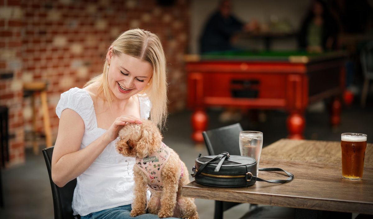 woman and puppy