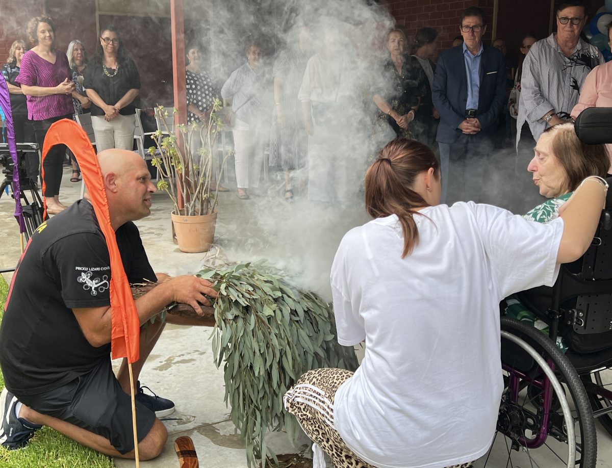 Luke Wighton delivers a smoking ceremony at the opening of the revamped Old Federal Brewery.