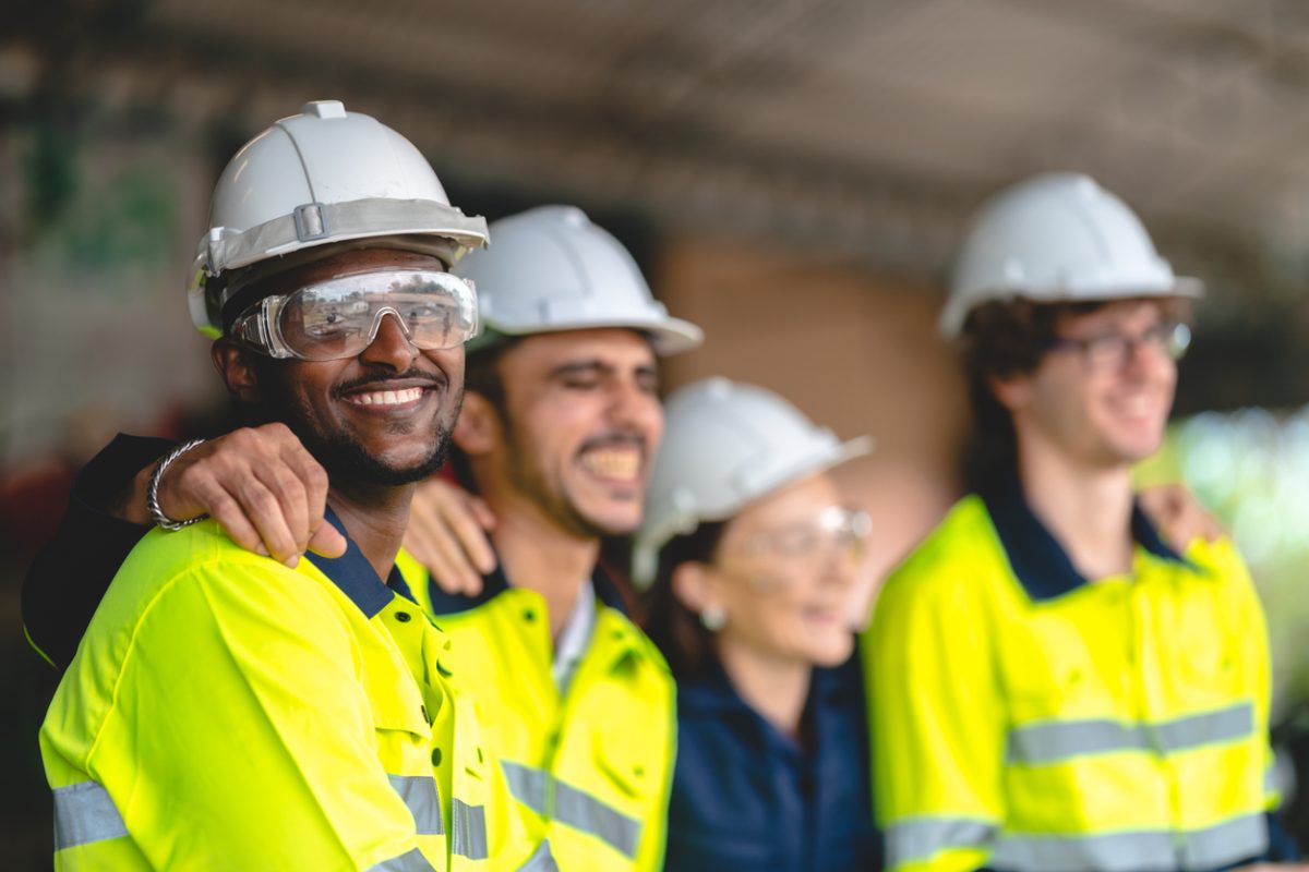 Builder workers together on site