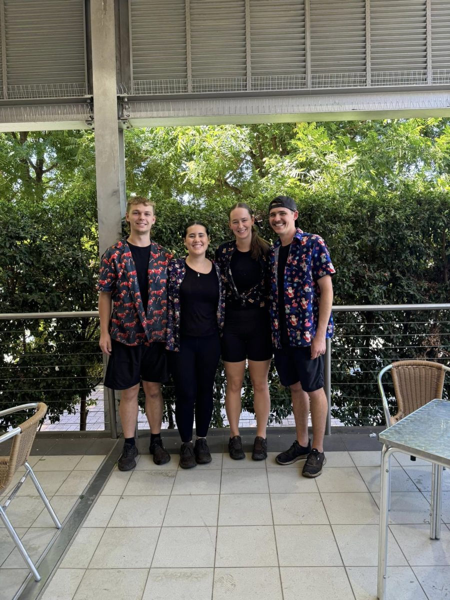 Four young people at a cafe 