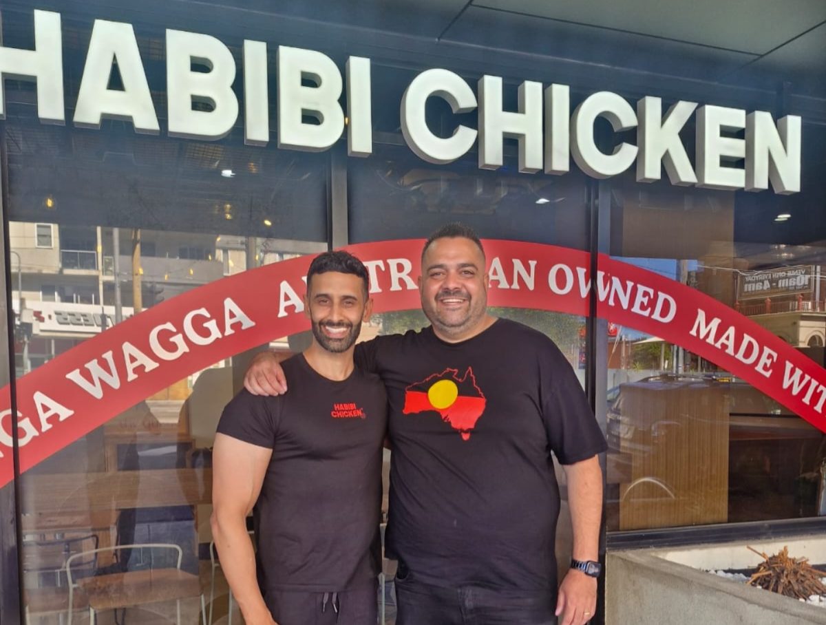 Habibi Chicken co-owner Farhan Rehman and Wagga comedian Dane Simpson launched the chicken restaurants' new site in Preston, Melbourne last week.