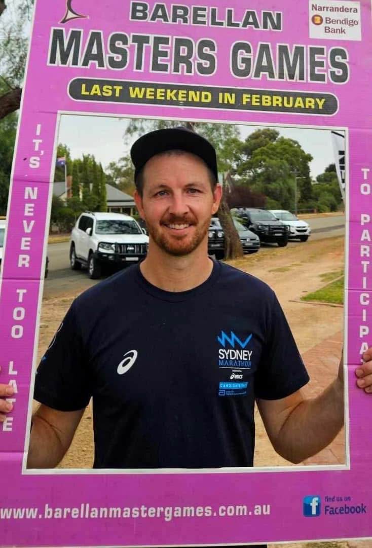 man in a frame promoting a sports tournament