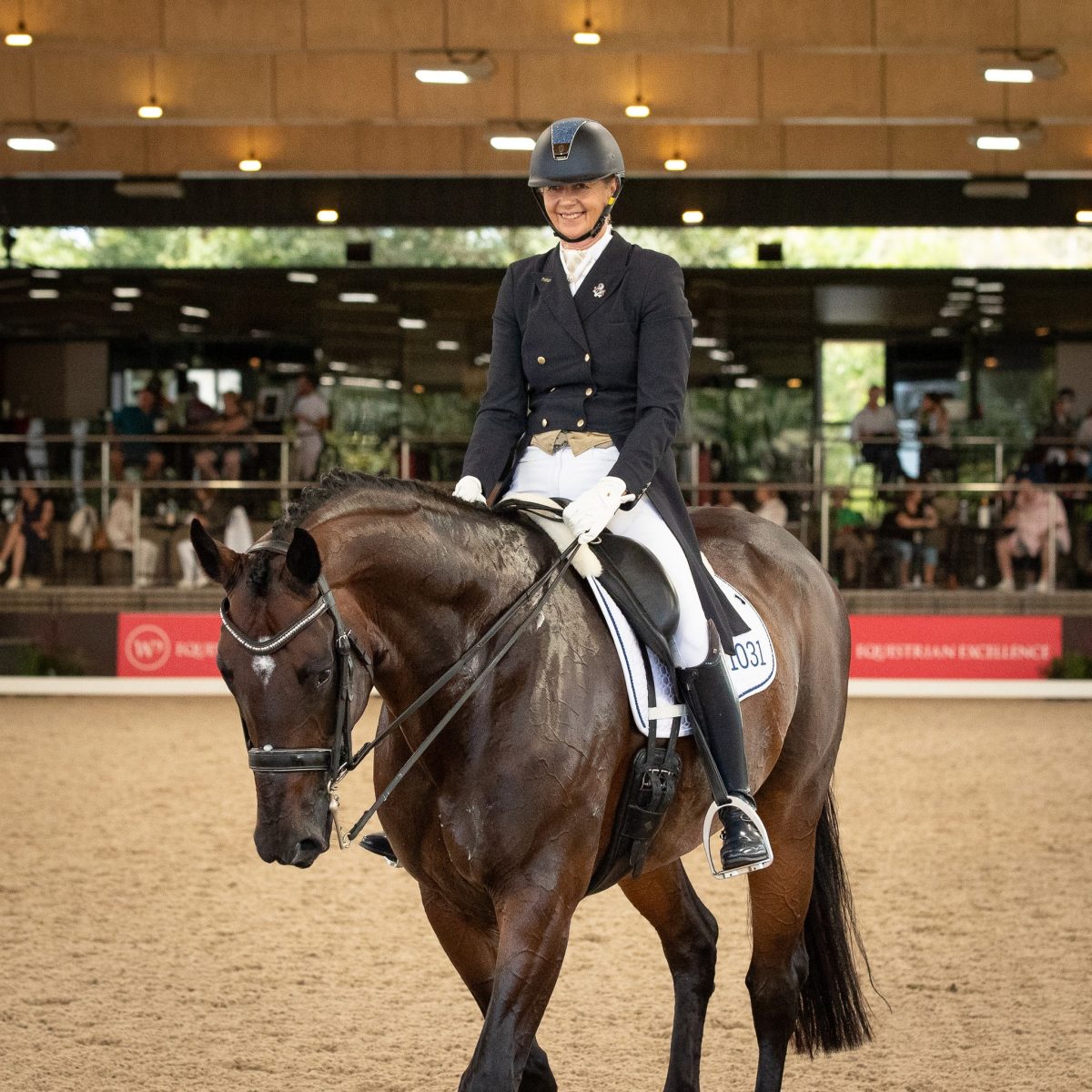 A happy Jodie Dunstan and H after one of their tests in the main arena at the spectacular Willinga Park Dressage by the Sea event. 