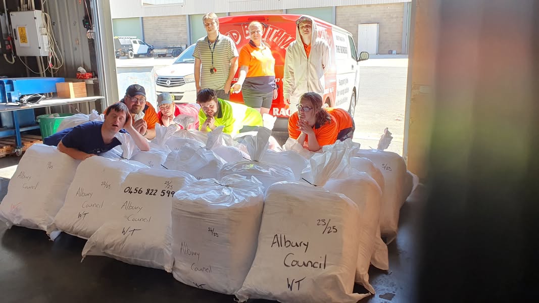 A job well done ... Red Bantam team members with a purpose bulk order prepared for Albury City Council. 