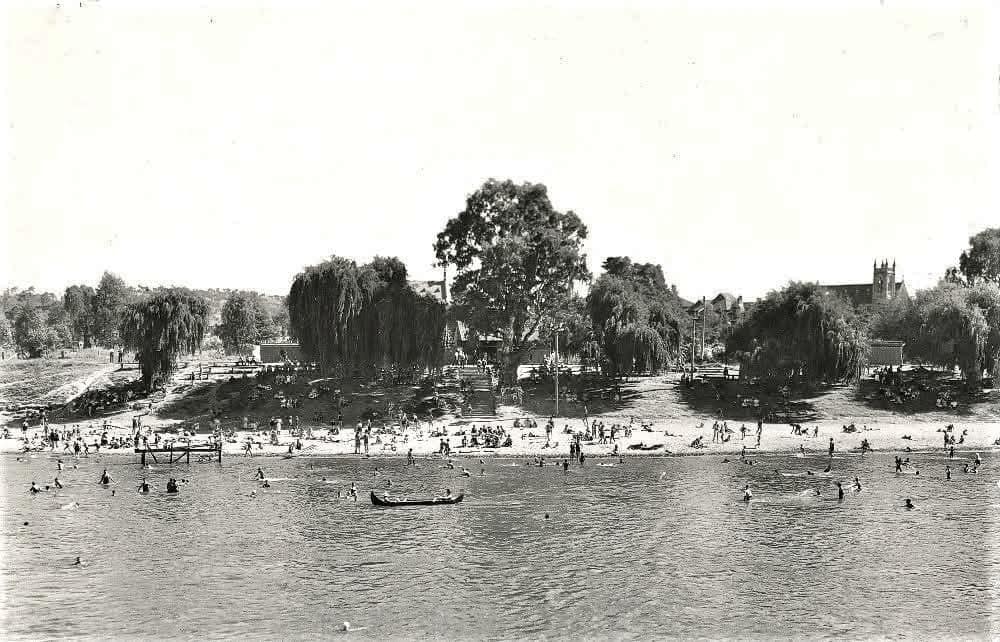 people at a beach in the 1930s