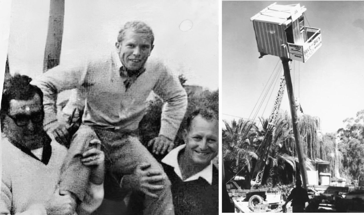 John Telfer and Ken Turner celebrate David Stephenson's feat of endurance after spending a week living on a pole in Wagga's CBD.