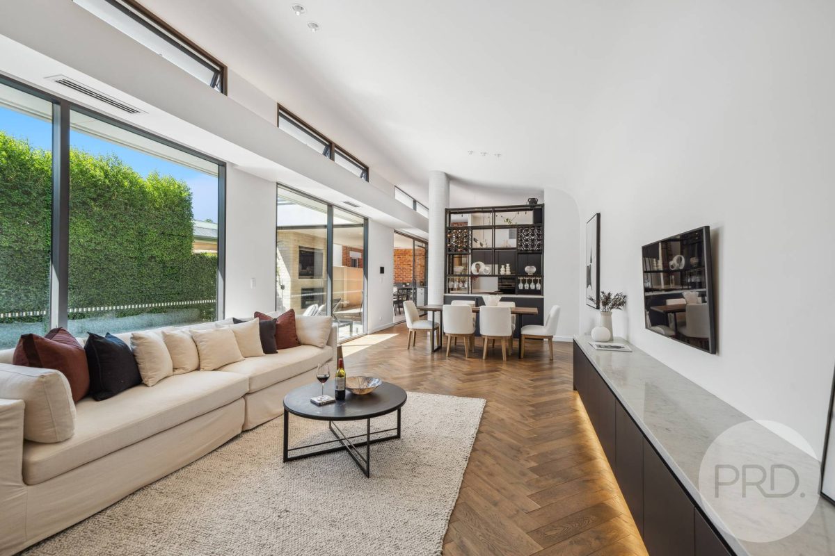 view of lounge and dining rooms in a home