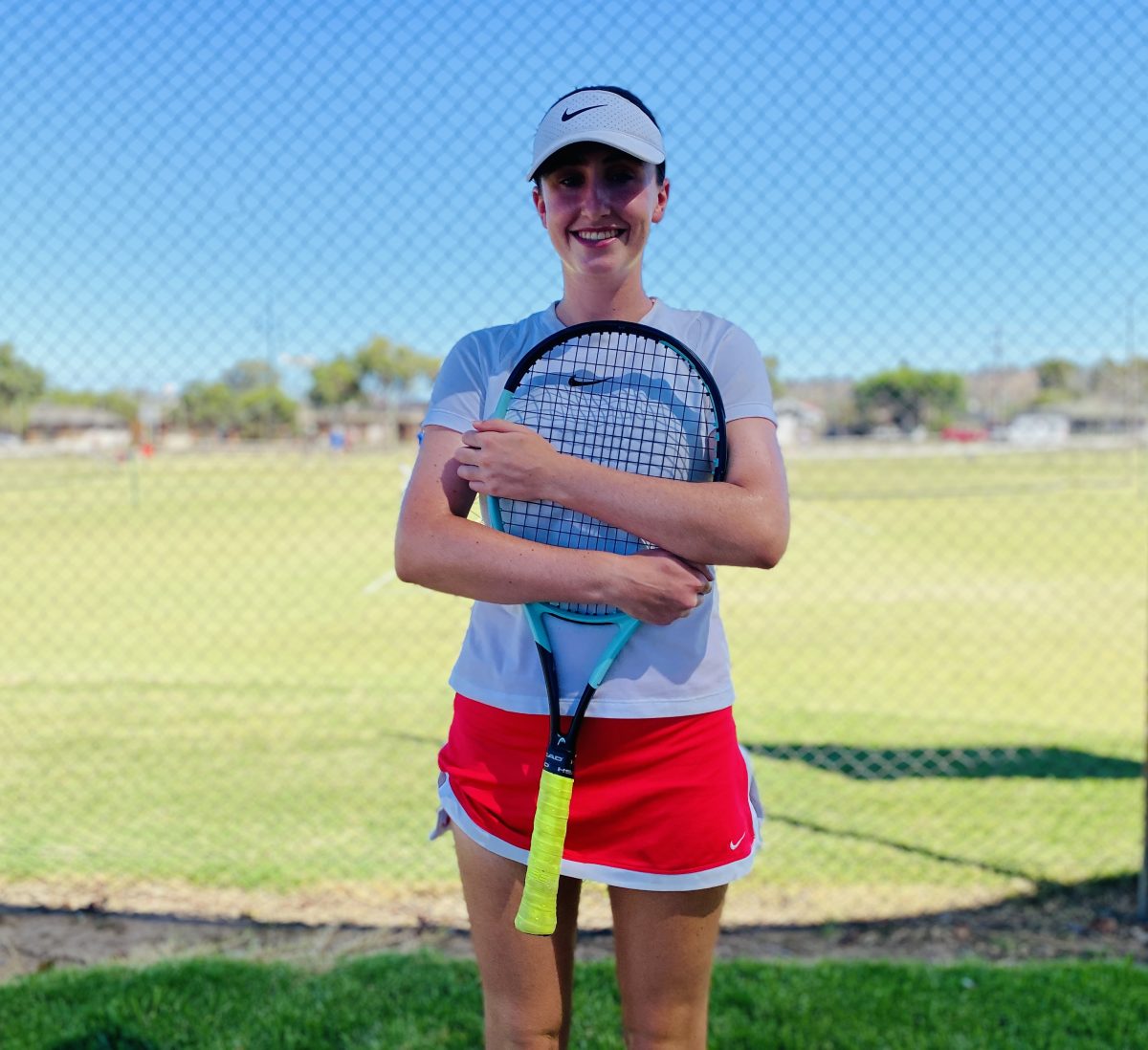 Girl with tennis racquet