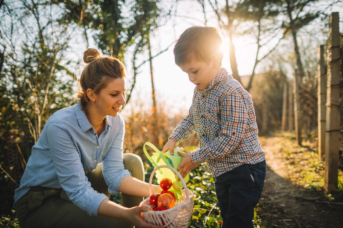 little boy and his mom on Easter egg hunt