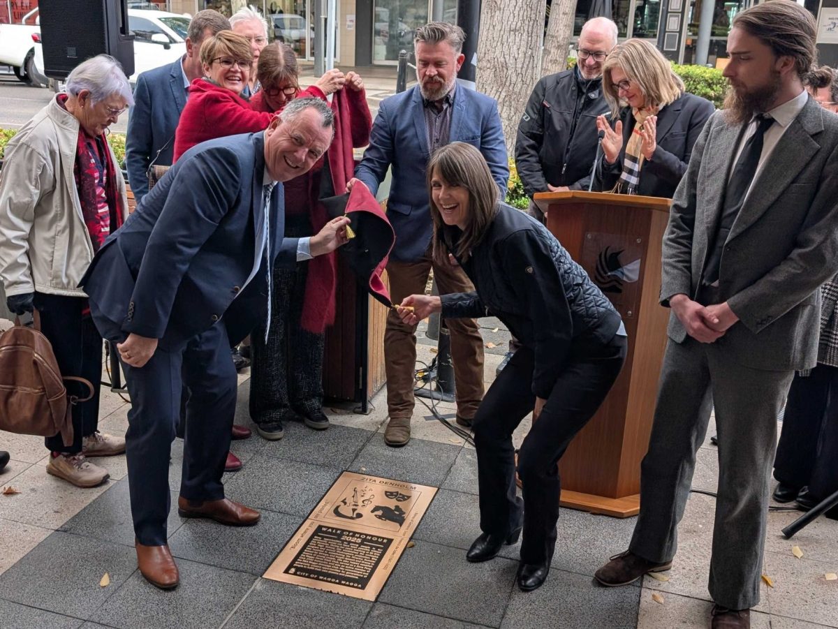 Family members of the late Zita Denholm gathered out the front of Myer in Wagga to unveil her plaque on the Wagga Walk of Honour.