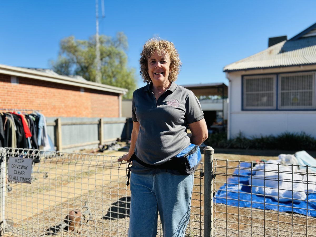 Michelle in front of neighbourhood house