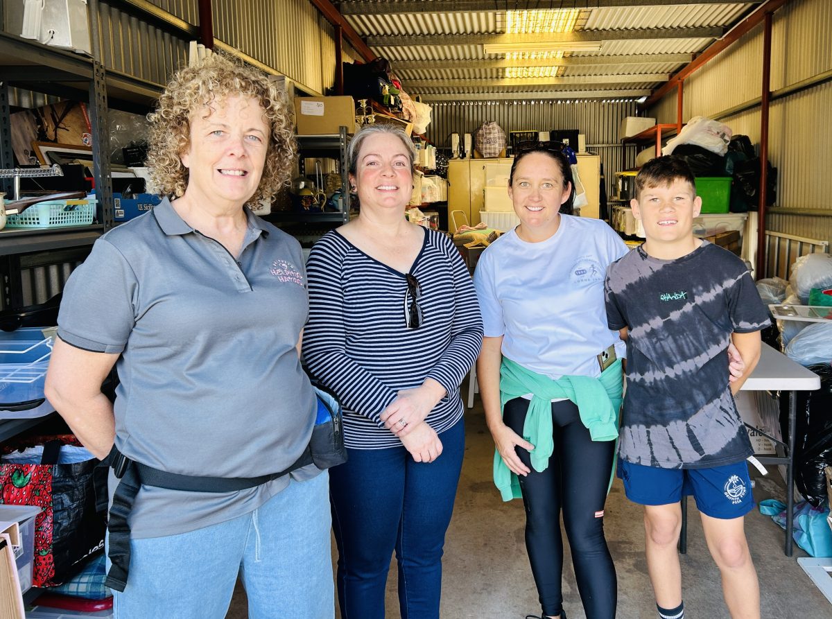 four people in shed
