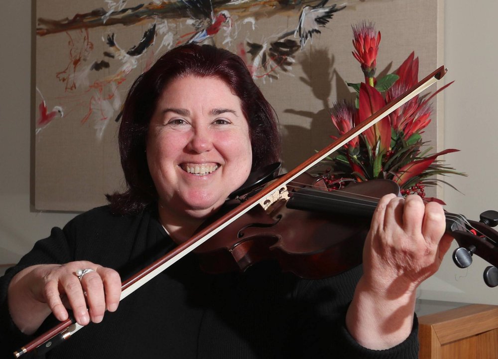 woman playing a violin