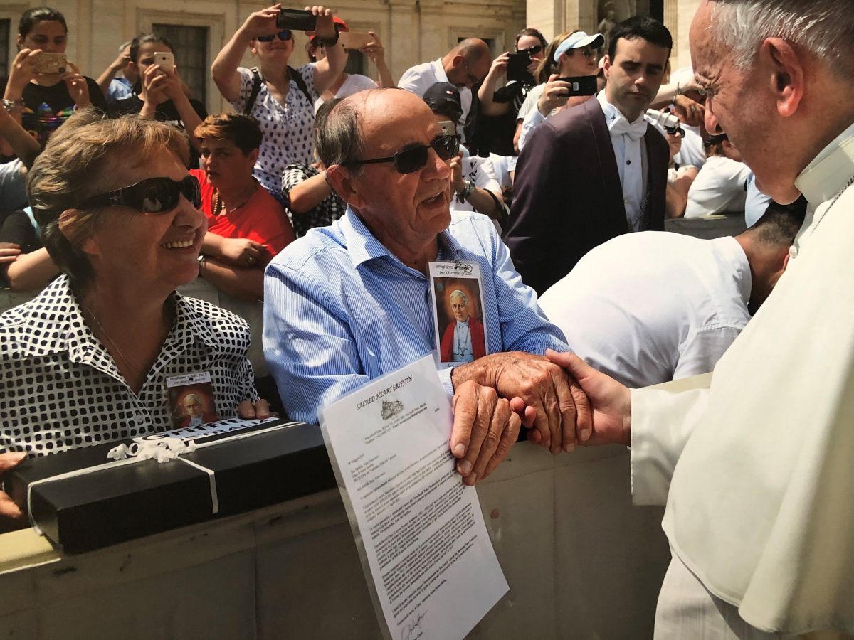 man with Pope Francis