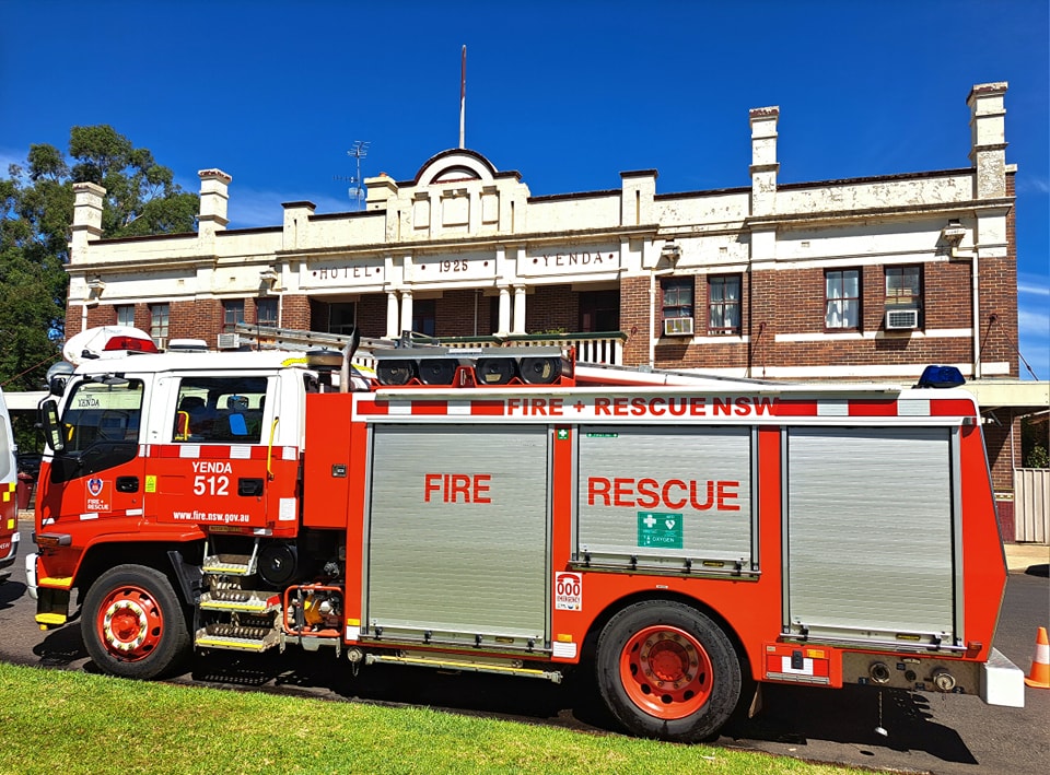 Fire truck outside station.