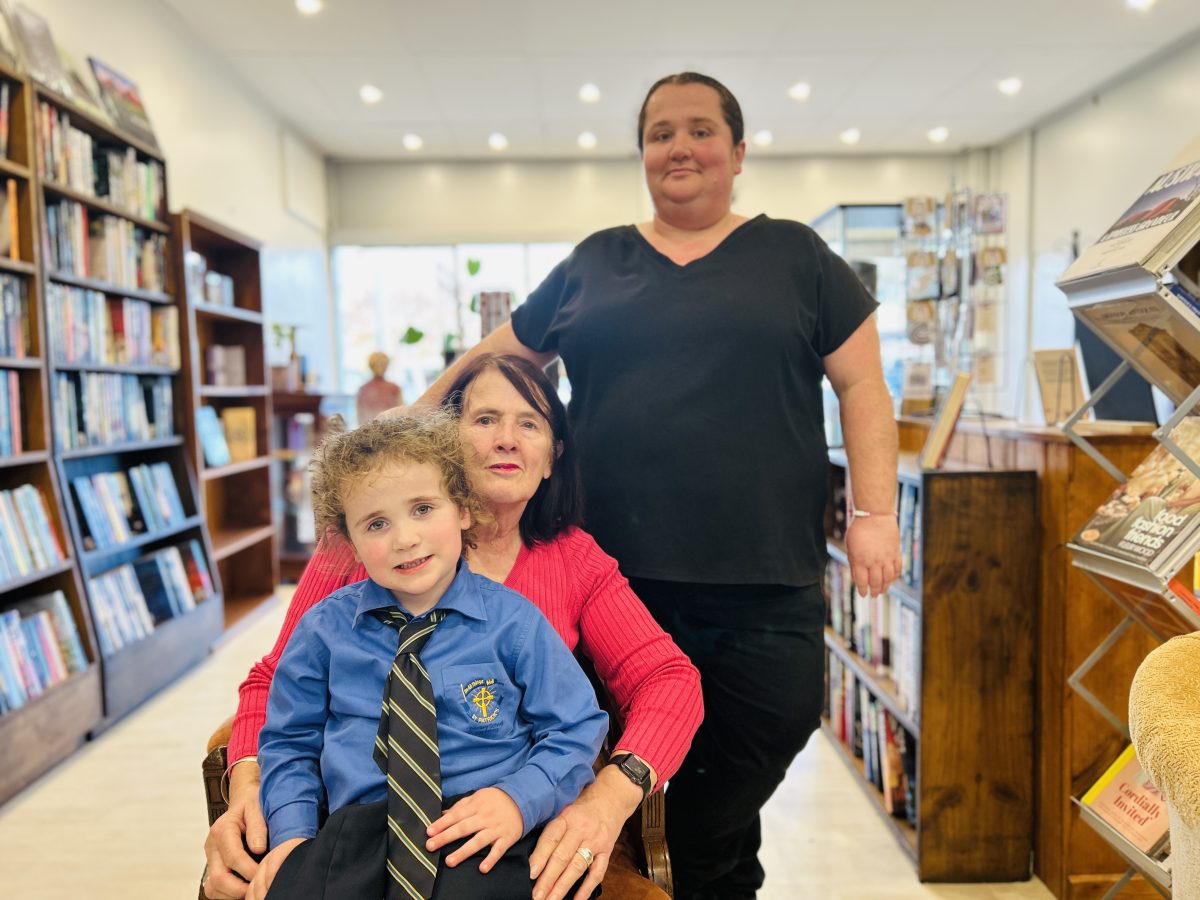 Mum, daughter and grandma in bookstore