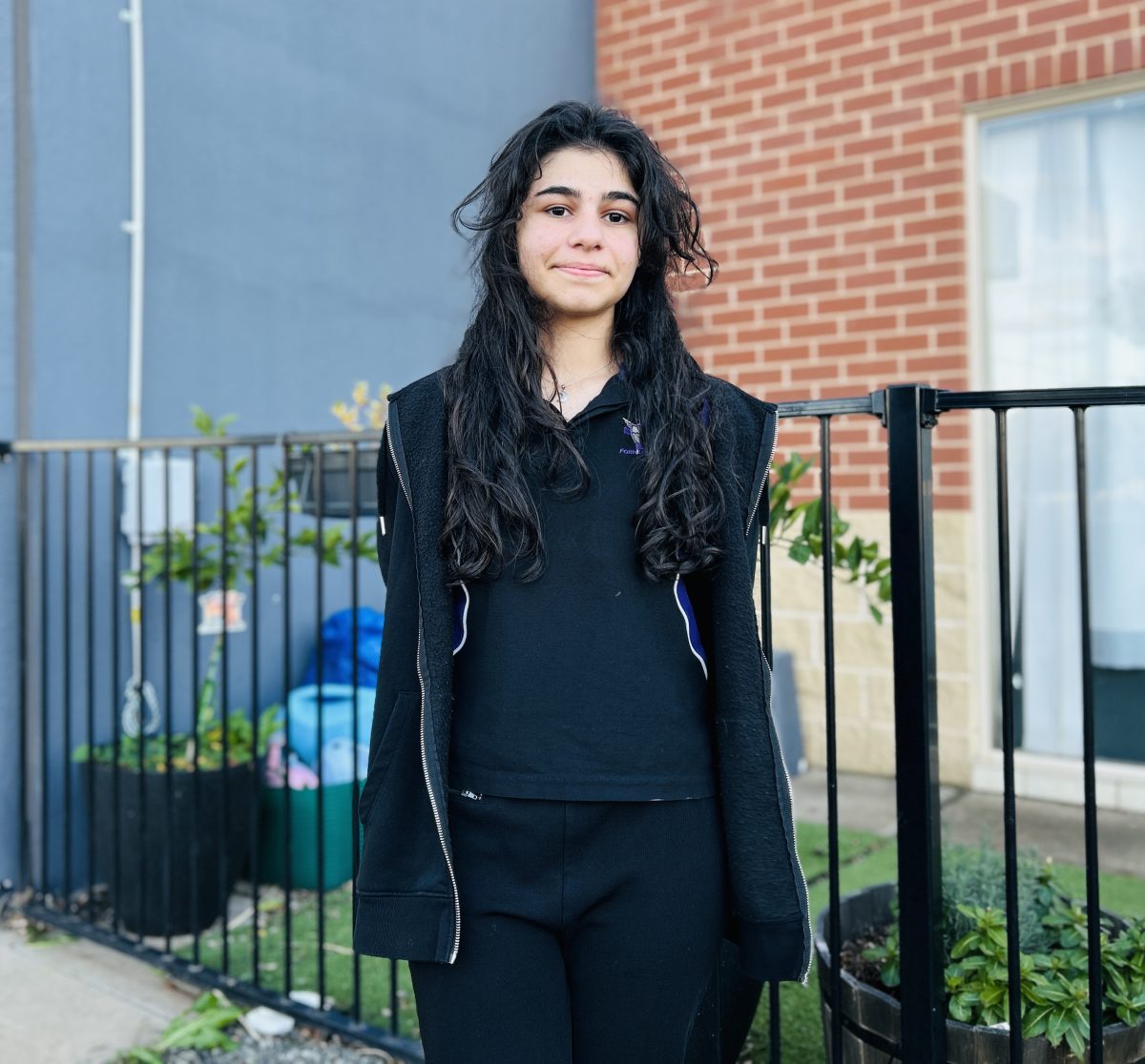 girl in front of school
