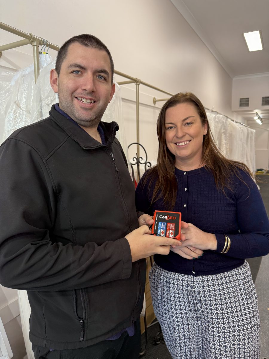 Lifesavers Rory McKenzie and Kim McArthur, who saved a man's life yesterday with CPR and a (pictured) portable defibrillator. Picture: Marguerite McKinnon