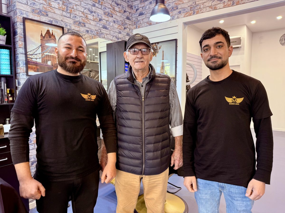 Solid support. Wagga retail legend Don Tuckwell said it's "wonderful" to have such gifted barbers as retial neighbours. Don is between barbers Sam Huseyan (Left) and Picture: Marguerite McKinnon