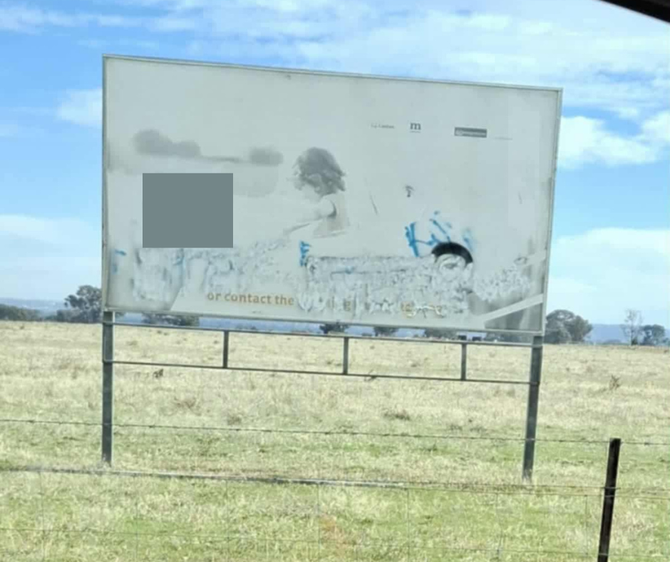 The sign outside the Wagga airport, with the slur covered digitally.