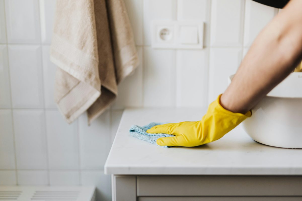 someone cleaning a sink