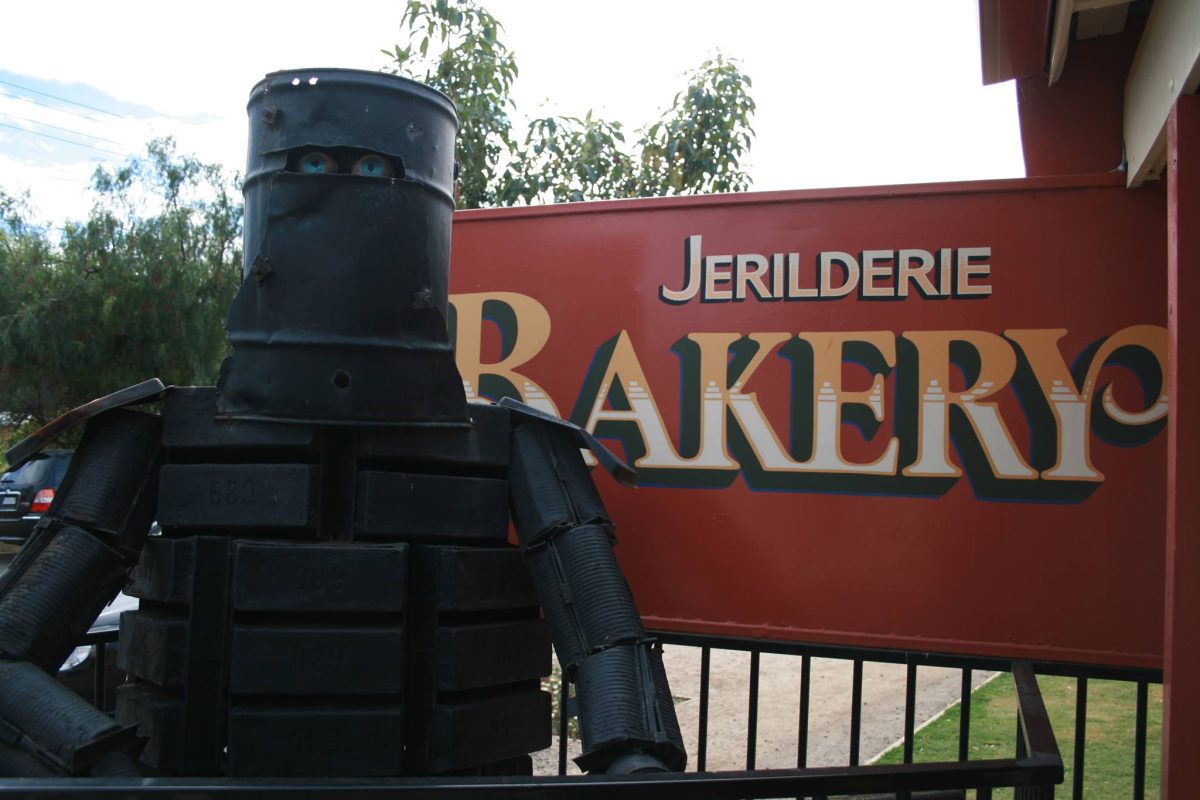 Ned Kelly with sign