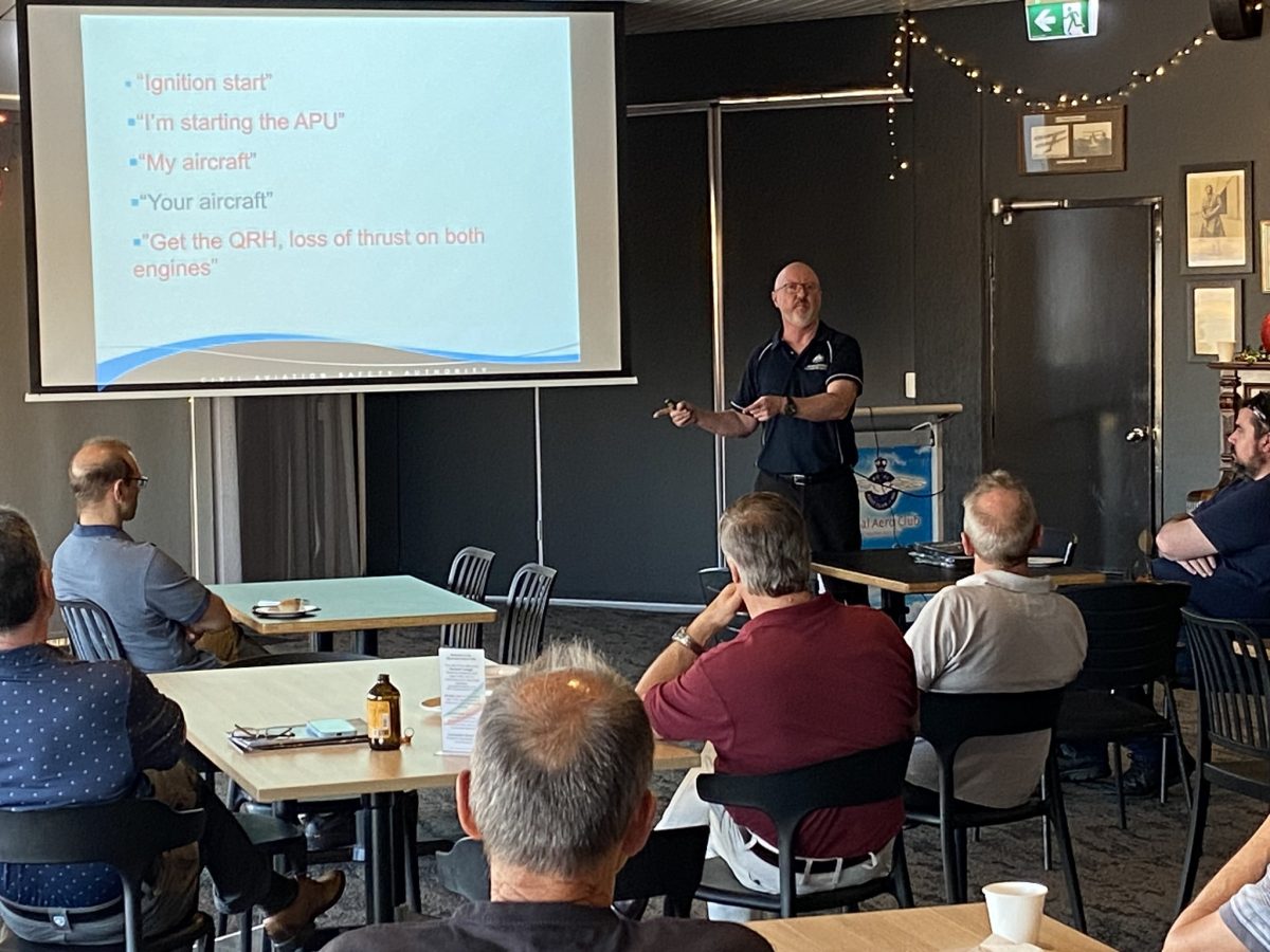 Guy in beard giving seminar 
