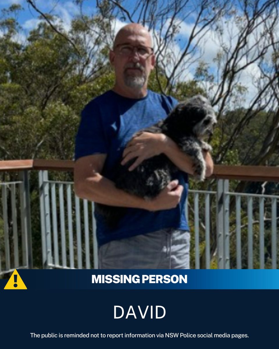 man holding dog
